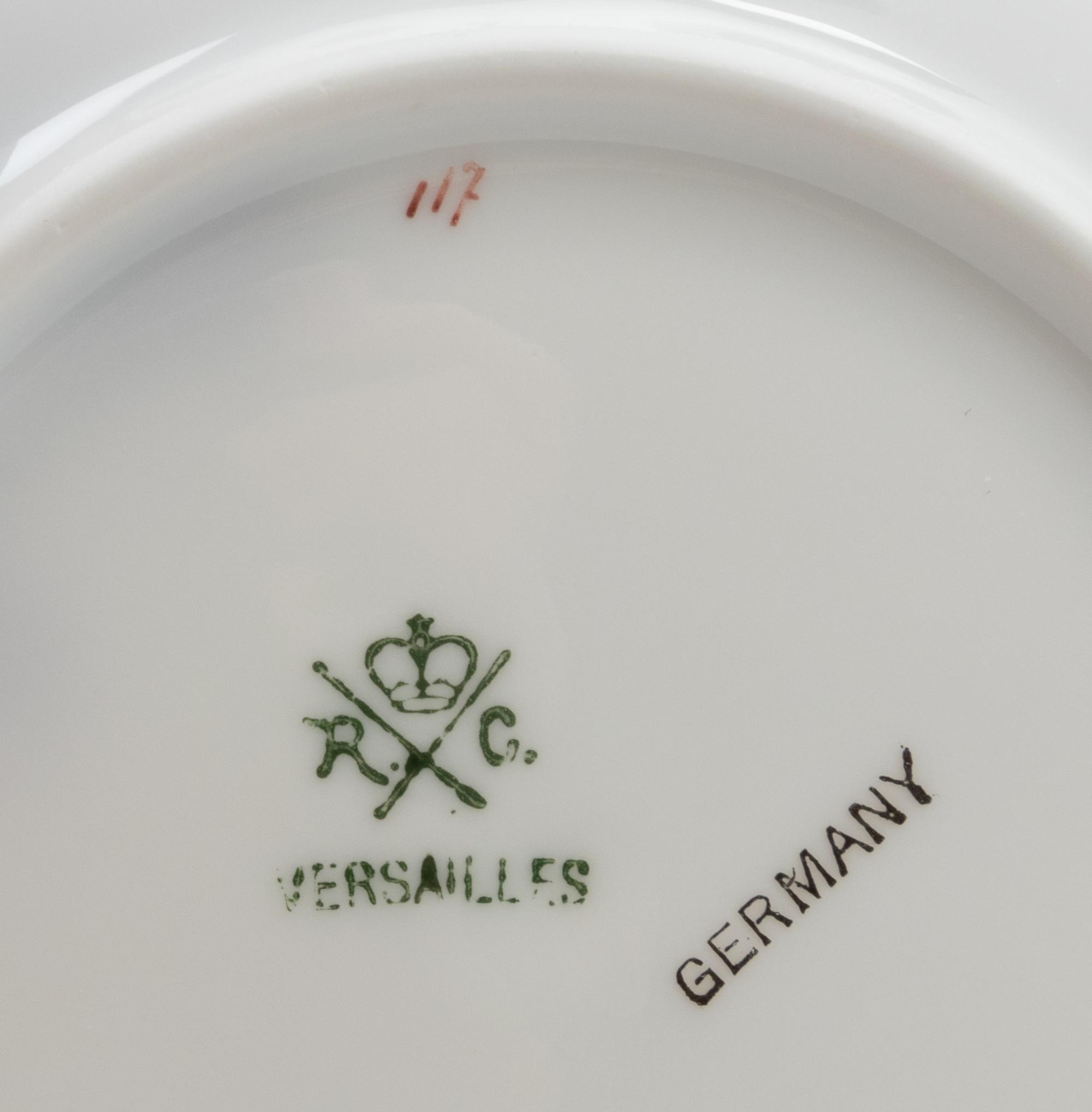 A Set of German Porcelain Teacups and Saucers
