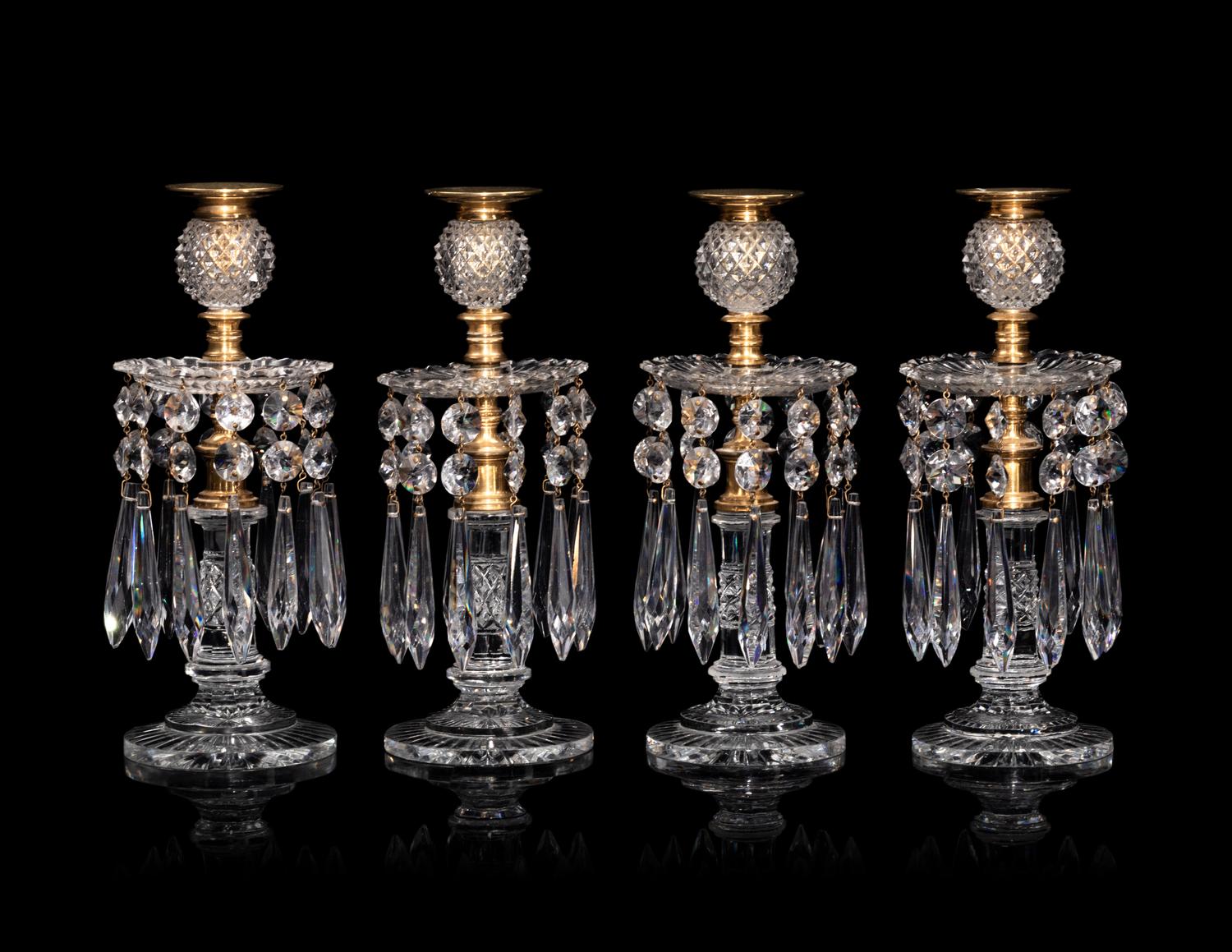 A Set of Four Regency Brass-Mounted Cut Glass Candlesticks