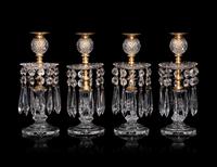 A Set of Four Regency Brass-Mounted Cut Glass Candlesticks