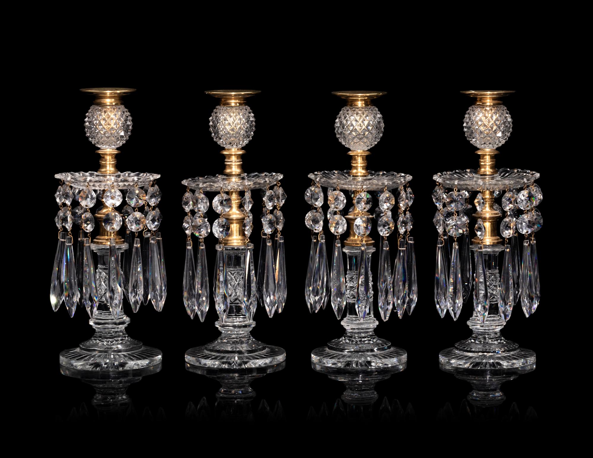 A Set of Four Regency Brass-Mounted Cut Glass Candlesticks