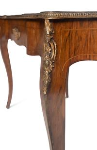 A Louis XV Style Gilt Metal Mounted Rosewood Bureau Plat