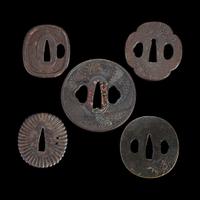 Group of fifteen assorted Japanese tsuba Meiji period and earlier