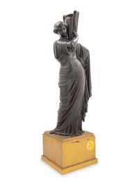 A Continental Bronze Figure of a Classical Maiden with an Ewer