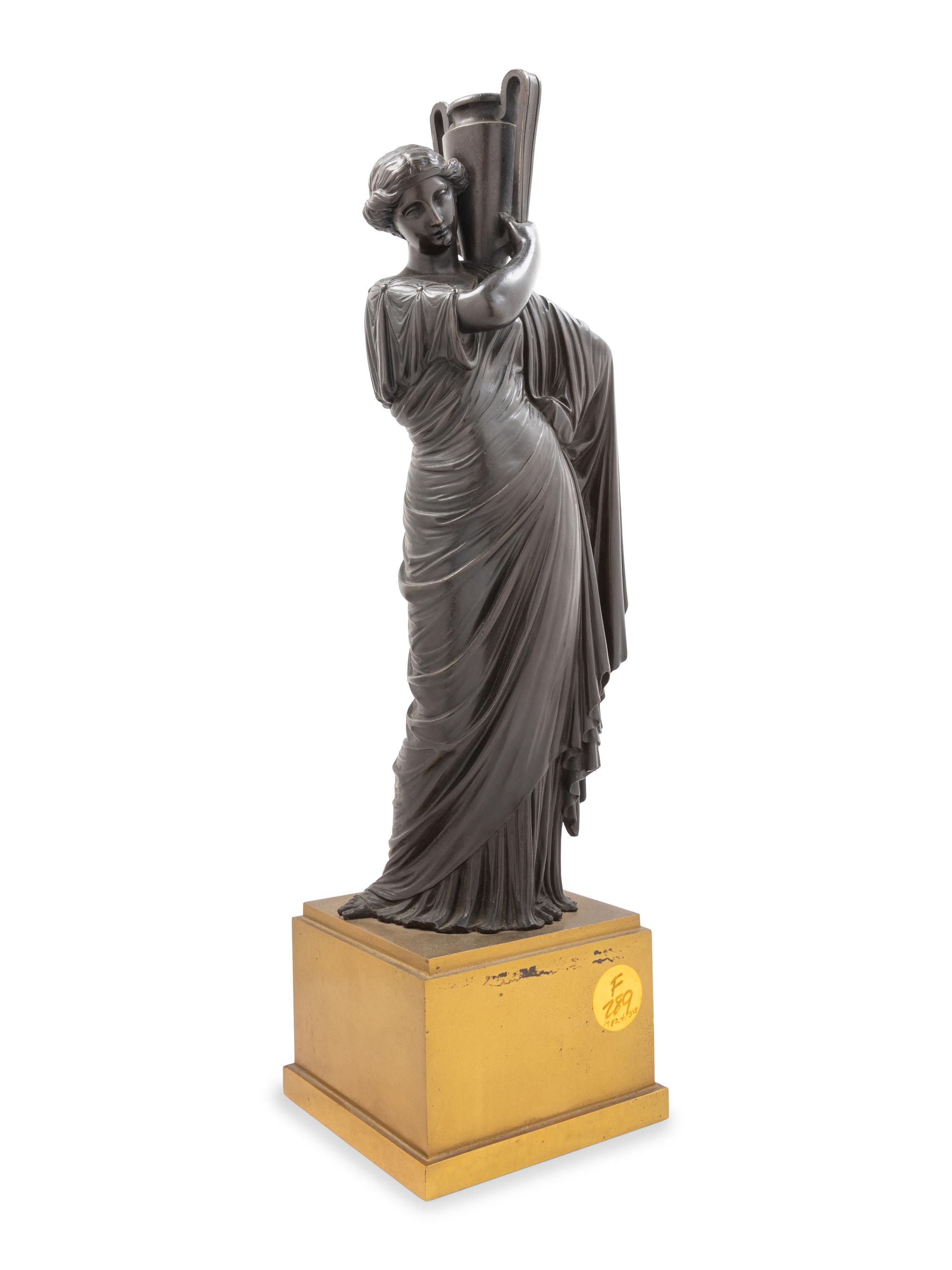 A Continental Bronze Figure of a Classical Maiden with an Ewer