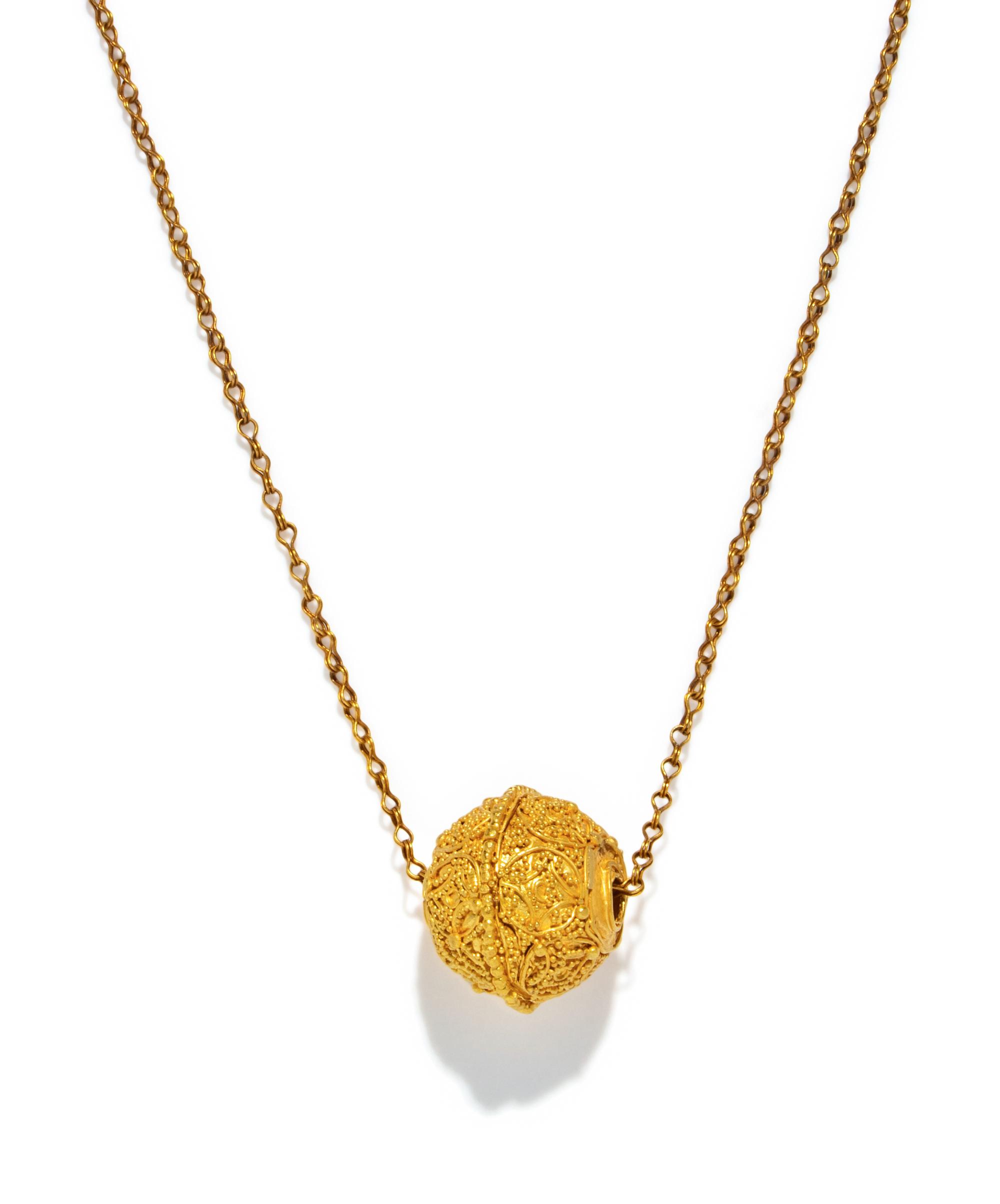 A Greek Gold Necklace with a Filigree Bead