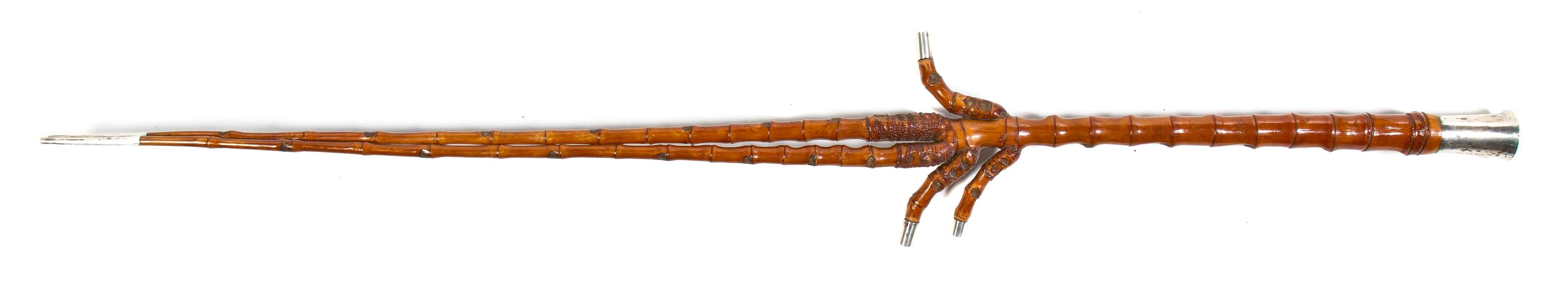 A Bamboo and Silvered Metal Walking Stick, Height overall 45 1/2 x height of handle 2 5/8 inches.