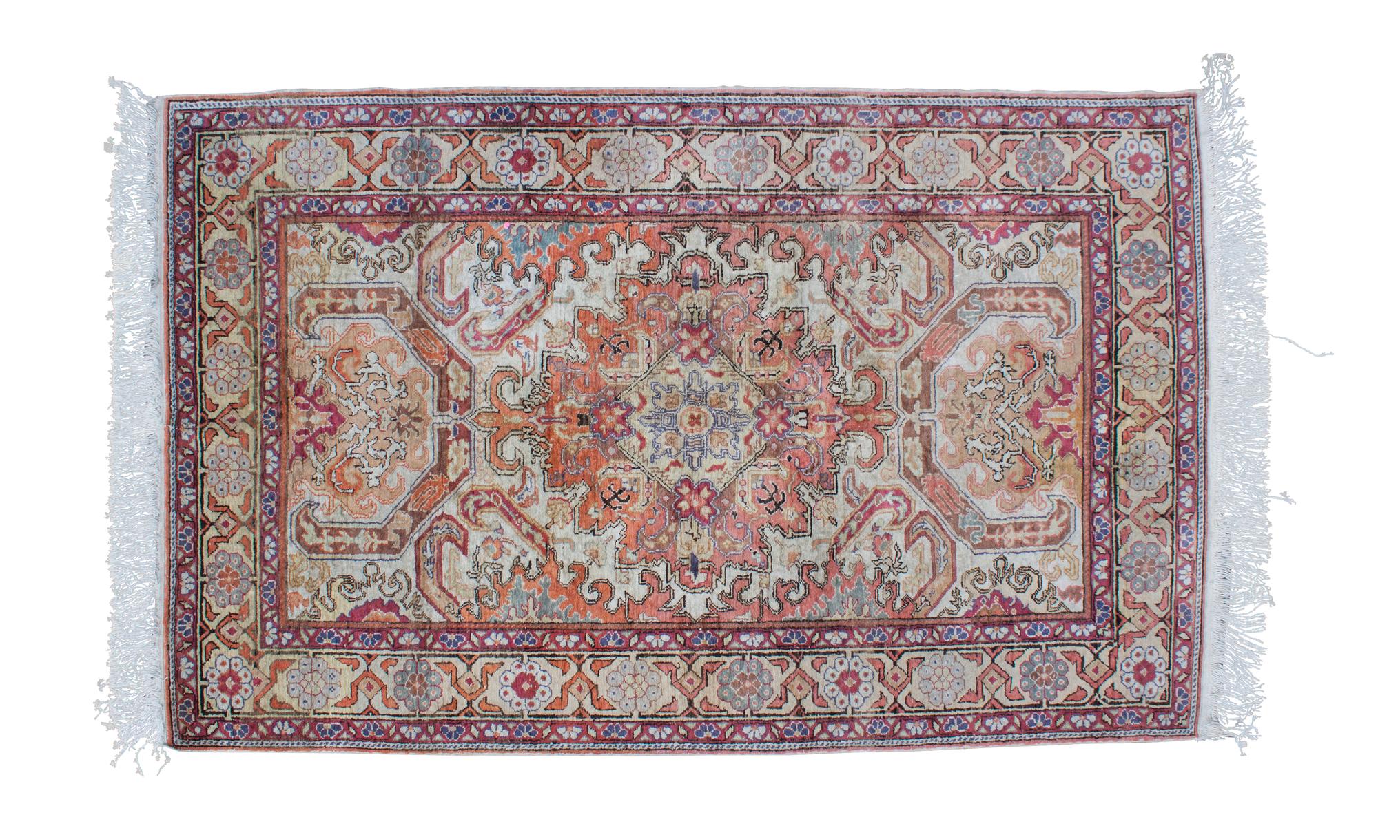 A Persian Silk Rug 6 feet 4 inches x 4 feet.