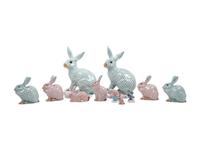 Nine Herend Painted and Parcel Gilt Porcelain Rabbits