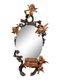 A Venetian Carved Walnut Mirror