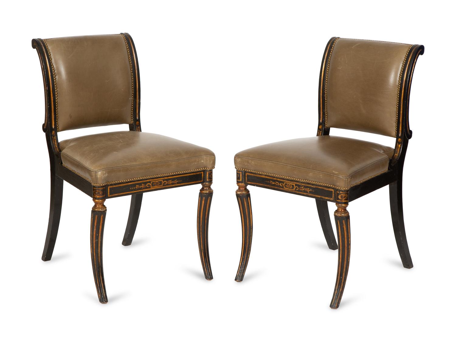 A Set of Four English Regency Style Ebonized and Parcel Gilt Mahogany Dining Chairs