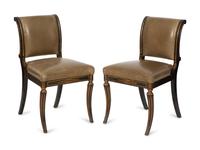 A Set of Four English Regency Style Ebonized and Parcel Gilt Mahogany Dining Chairs