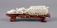 An Asian Ivory Carving of a Crab Cage, Length 8 1/4 inches.
