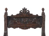 An Italian Renaissance Revival Carved Walnut Savonarola Chair