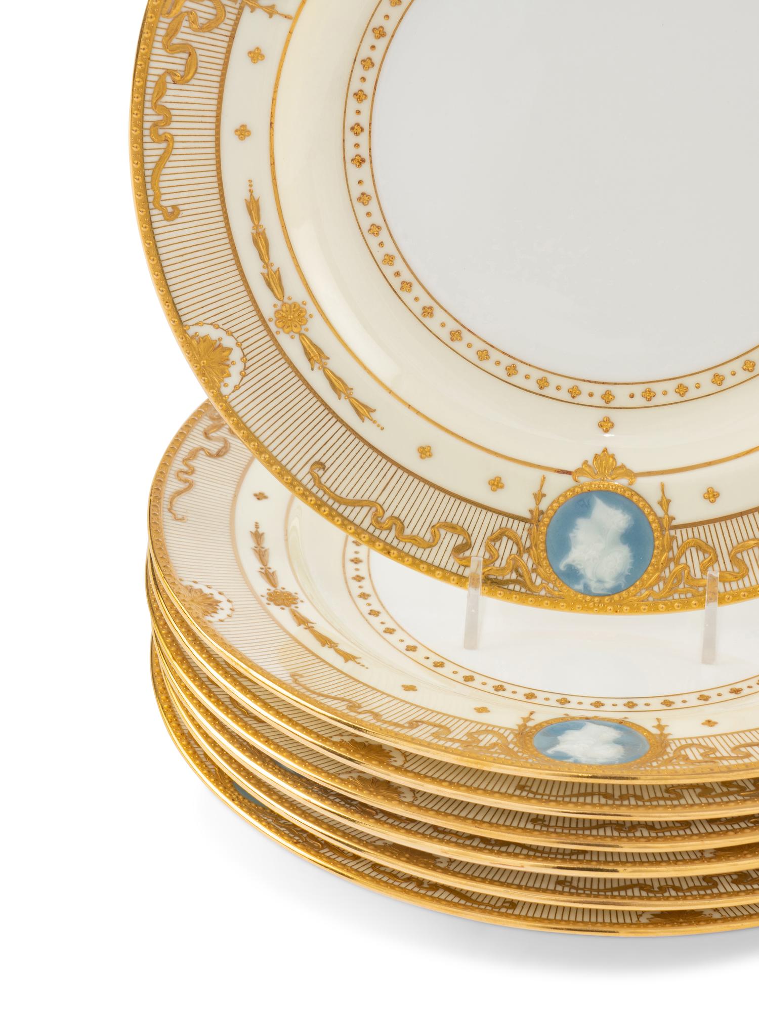 A Set of Fourteen Minton Pâte-sur-Pâte Porcelain Plates