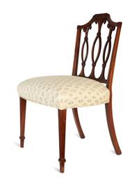 A Pair of Federal Carved Mahogany Side Chairs