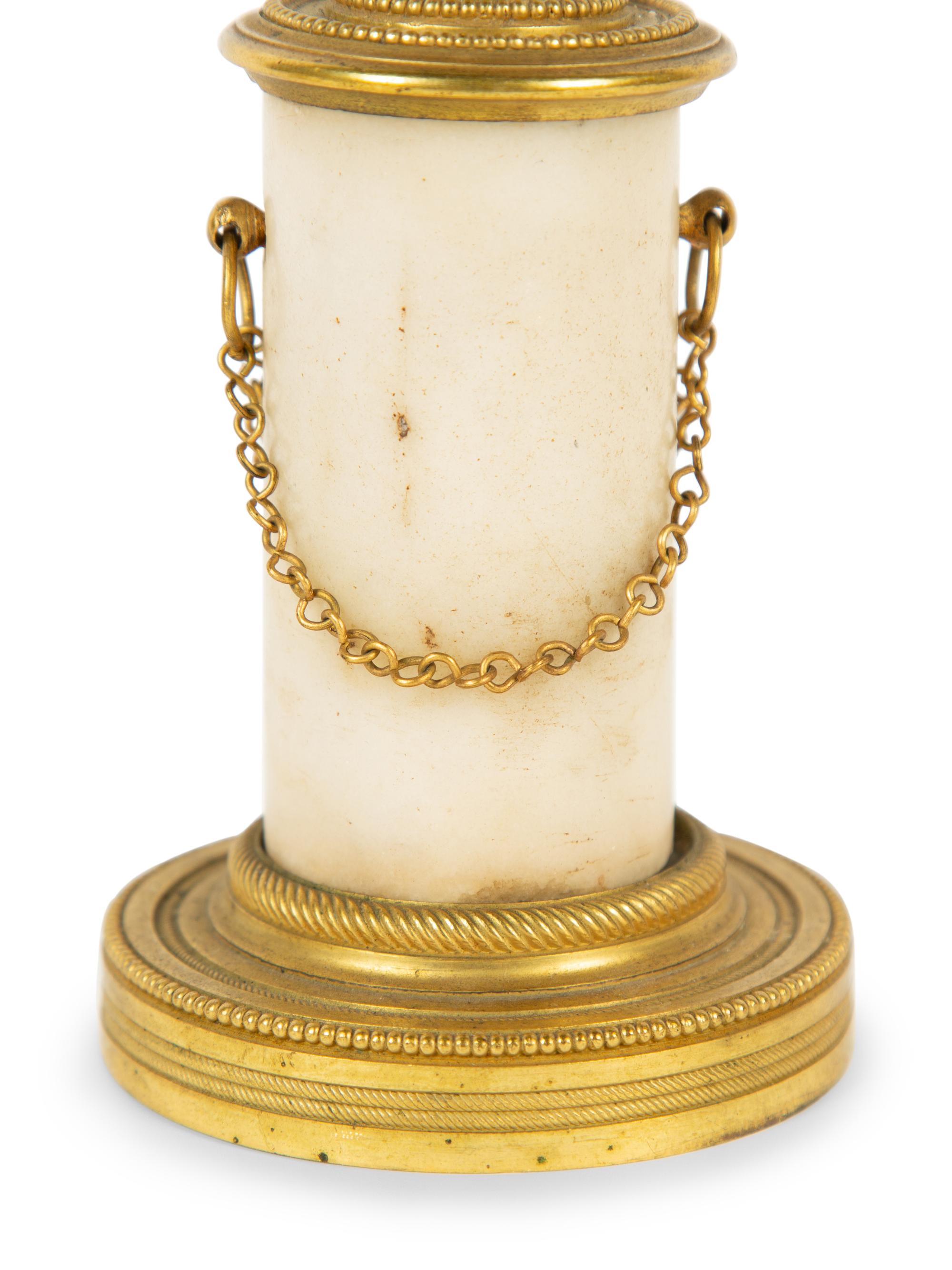 A Pair of French Bronze and Marble Small Busts