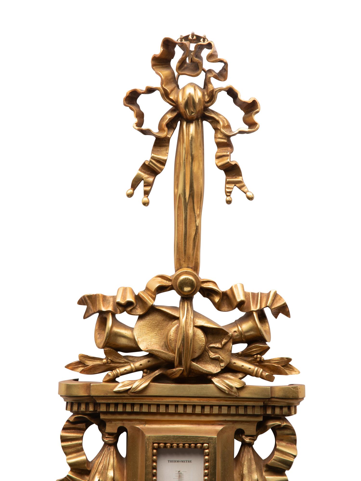 A French Gilt Bronze Clock and Barometer