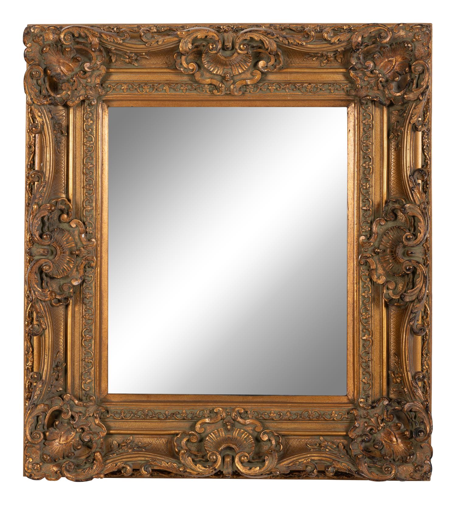 A Baroque Style Giltwood Mirror