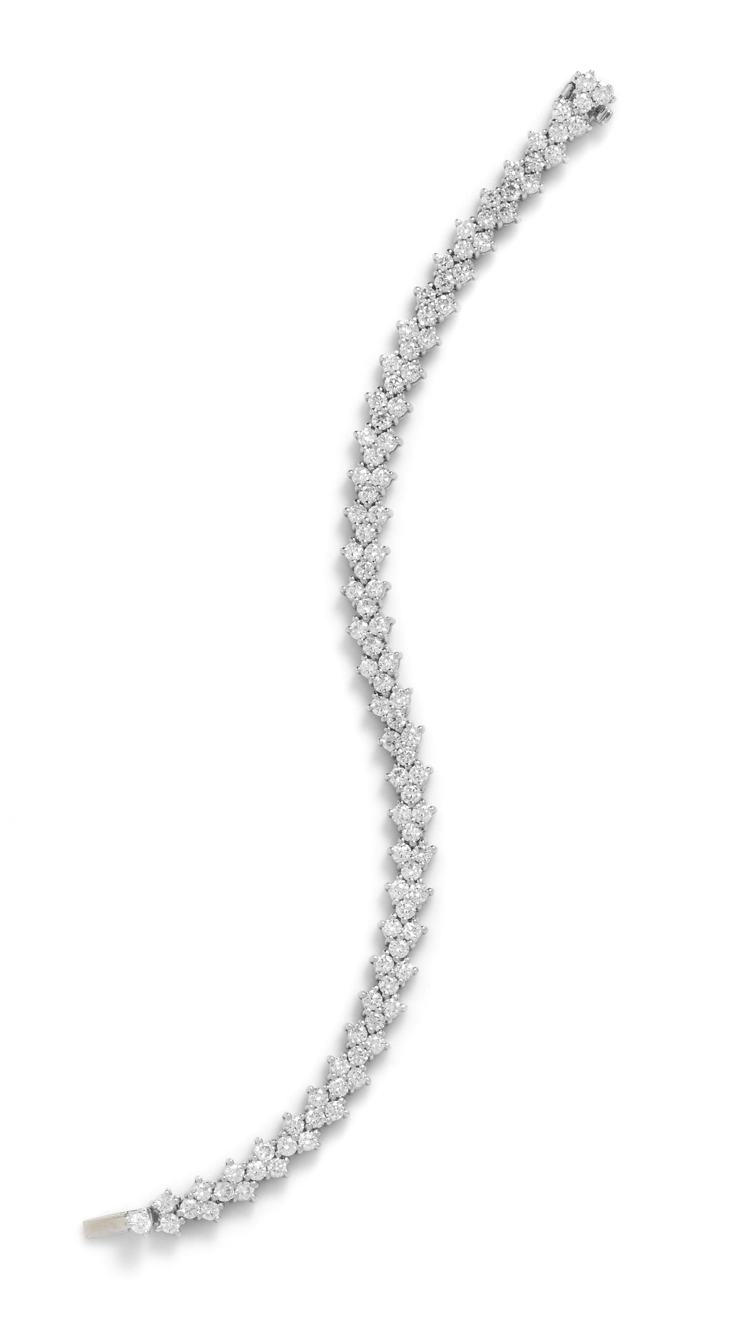 An 18 Karat and White Gold and Diamond Bracelet,