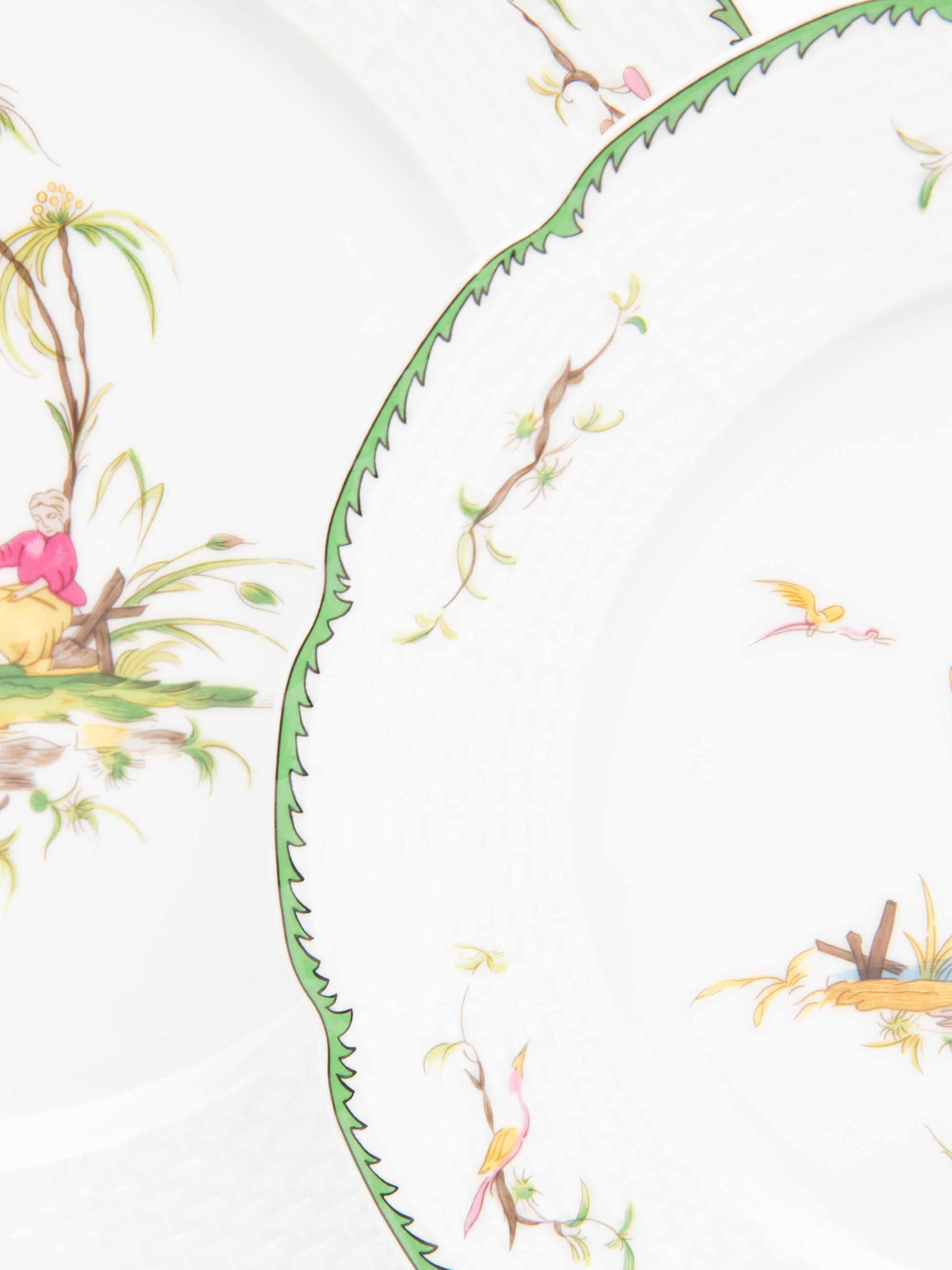 A Raynaud & Co. Limoges Porcelain Dinner Service