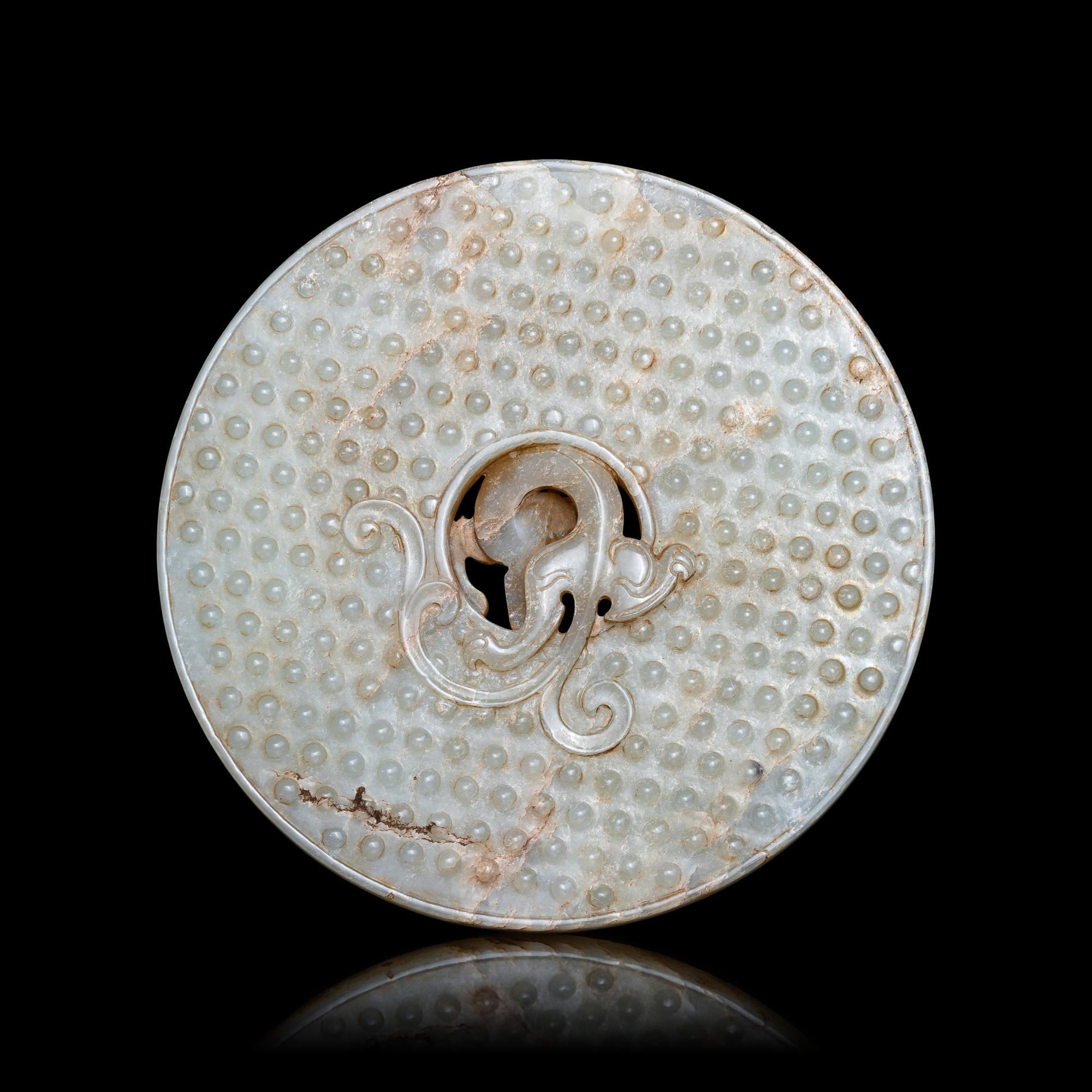 A Chinese Pale Celadon Jade 'Chilong' Bi Disk 青玉螭龍紋璧