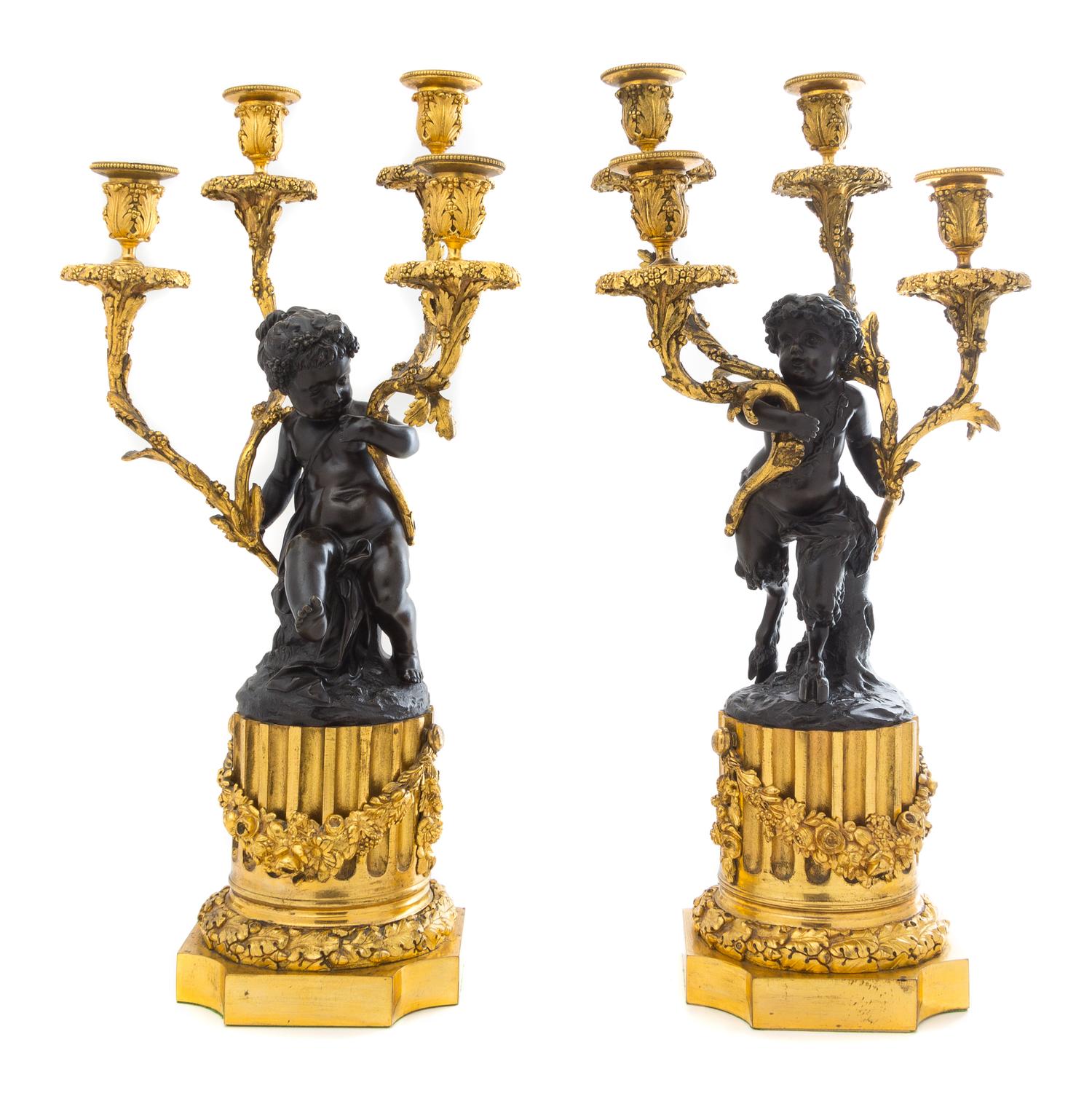 A Pair of French Gilt and Patinated Bronze Four-Light Figural Candelabra Height 21 3/4 inches. — 19TH CENTURY