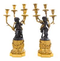 A Pair of French Gilt and Patinated Bronze Four-Light Figural Candelabra Height 21 3/4 inches. — 19TH CENTURY