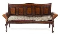 An English Oak Settle, Width 82 inches.