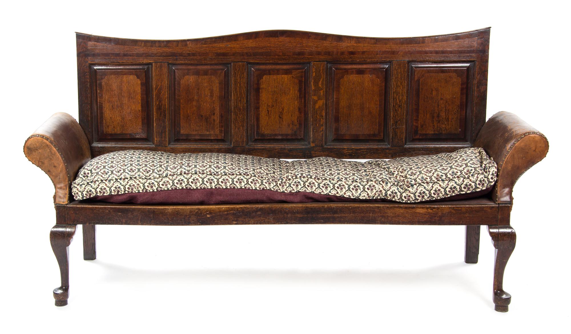An English Oak Settle, Width 82 inches.
