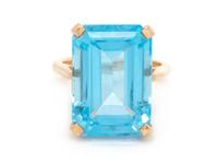 A 14 Karat Yellow Gold and Topaz Ring,