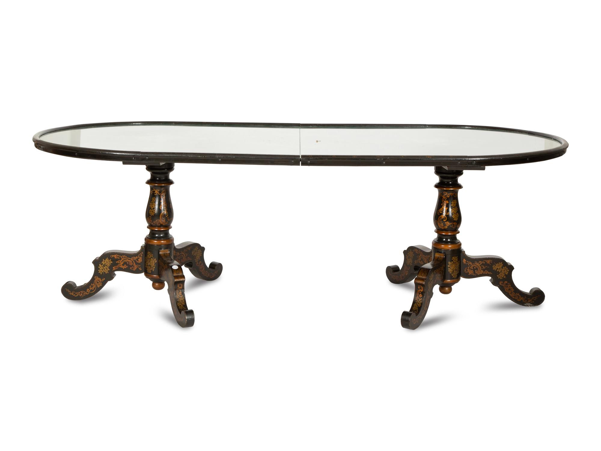 A Maison Jansen Painted and Parcel Gilt Lacquered Double Pedestal Dining Table