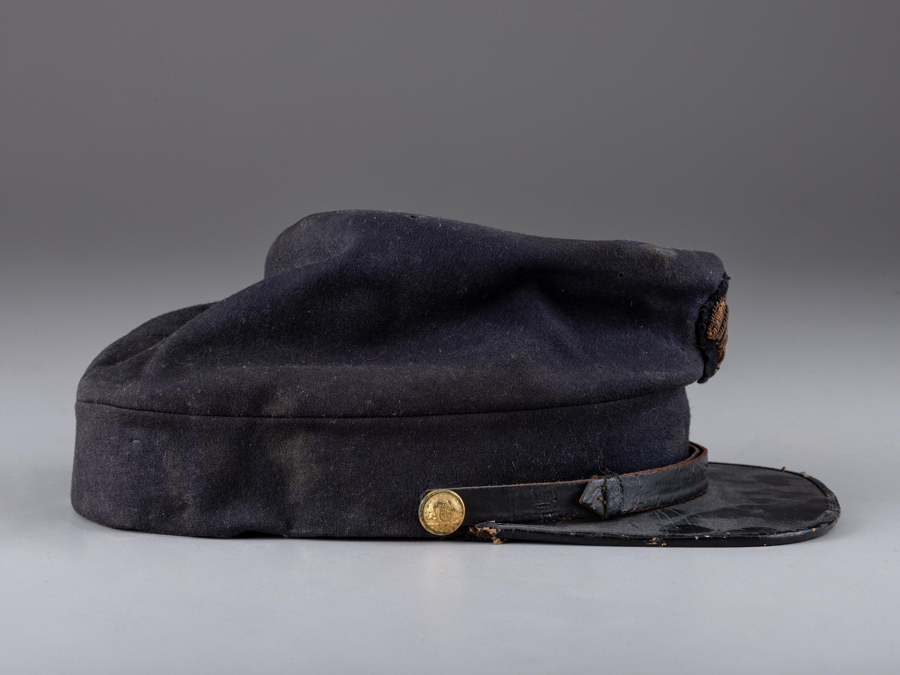 [CIVIL WAR]. 4th Rhode Island Infantry kepi identified to Captain Martin Page Buffum, POW at Petersburg. [ With :] ALLEN, George H. Forty-Six Months with the Fourth R.I. Volunteers.
