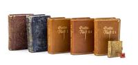 (MINIATURE BOOKS) A group of 7 miniature books.