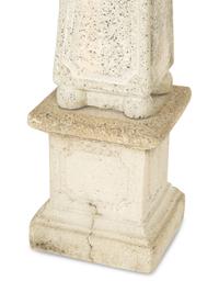 A Set of Four Cast Stone Obelisks