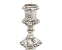 An Assembled Set of George III Sterling Silver Candlesticks