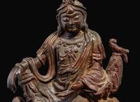 A small patinated bronze figure of "Water-Moon" Guanyin, 17th/18th century or earlier 銅加漆水月觀音像 十七至十八世紀或更早