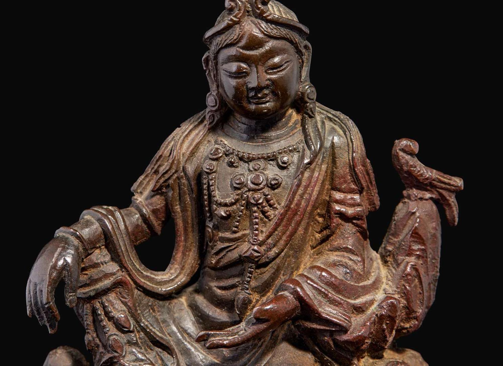 A small patinated bronze figure of "Water-Moon" Guanyin, 17th/18th century or earlier 銅加漆水月觀音像 十七至十八世紀或更早