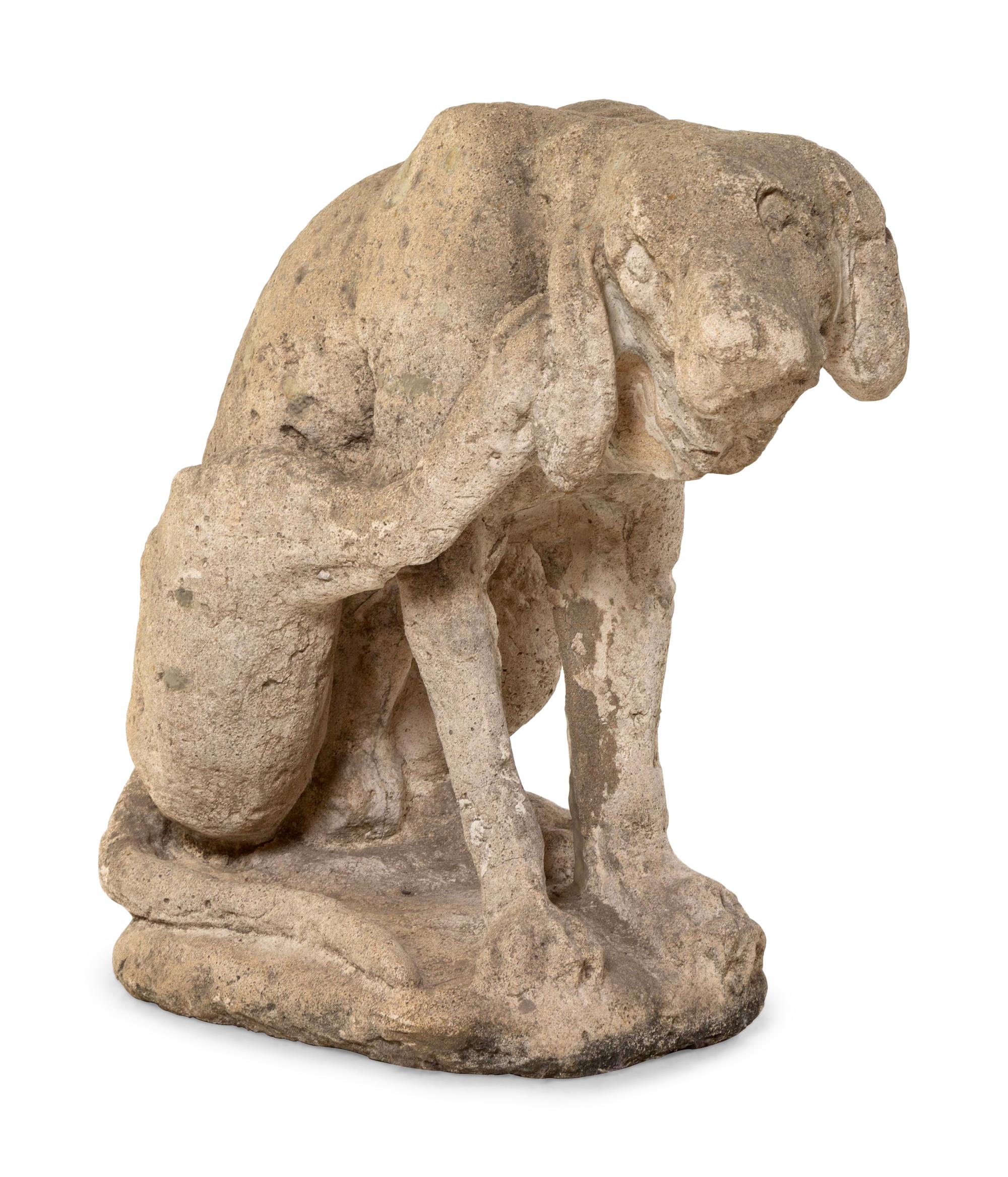 A Limestone Figure of a Seated Dog