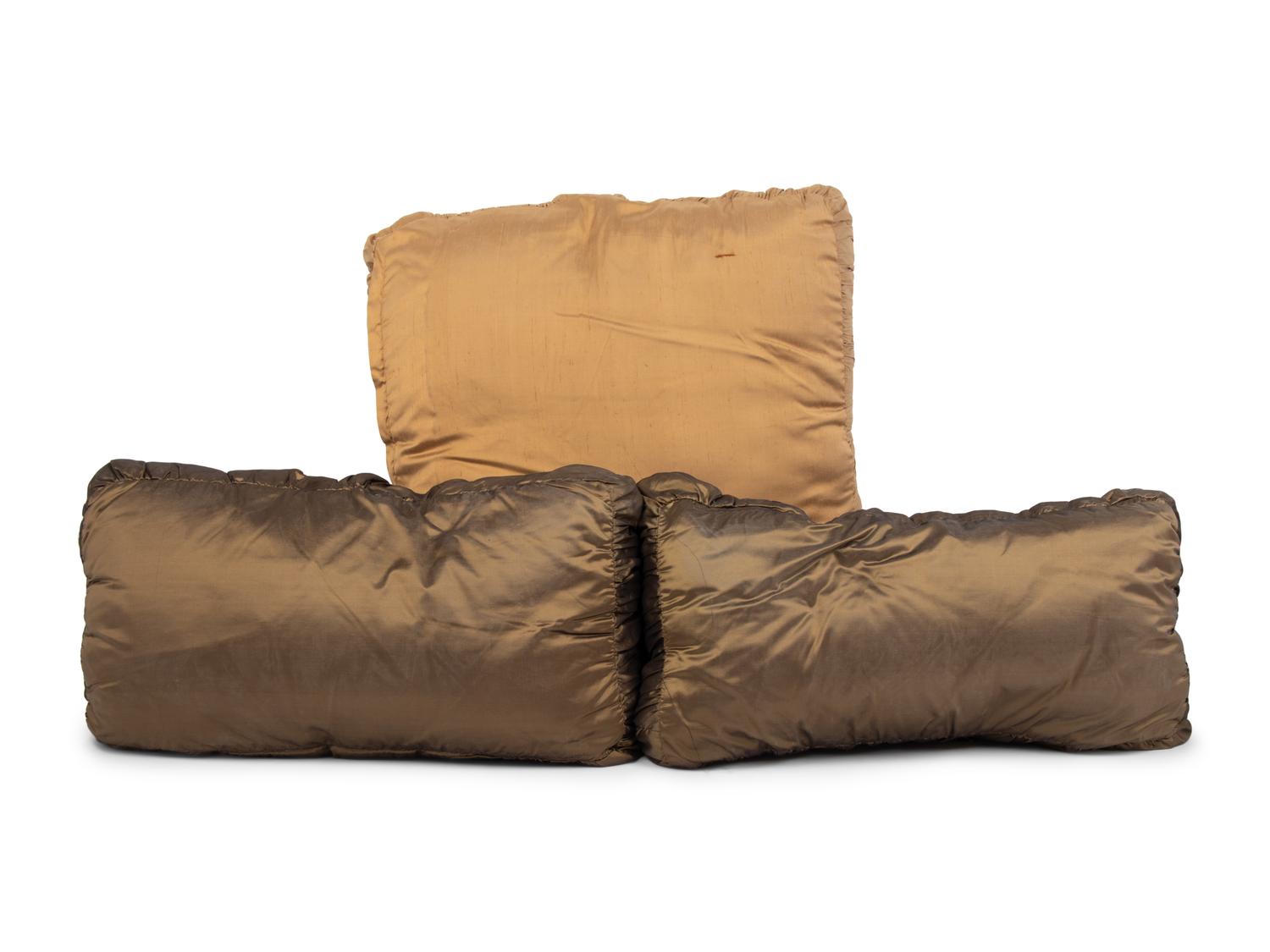 A Set of Three Velvet Upholstered Pillows with Tassels