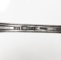 A Group of Three Russian Silver Flatware Serving Articles