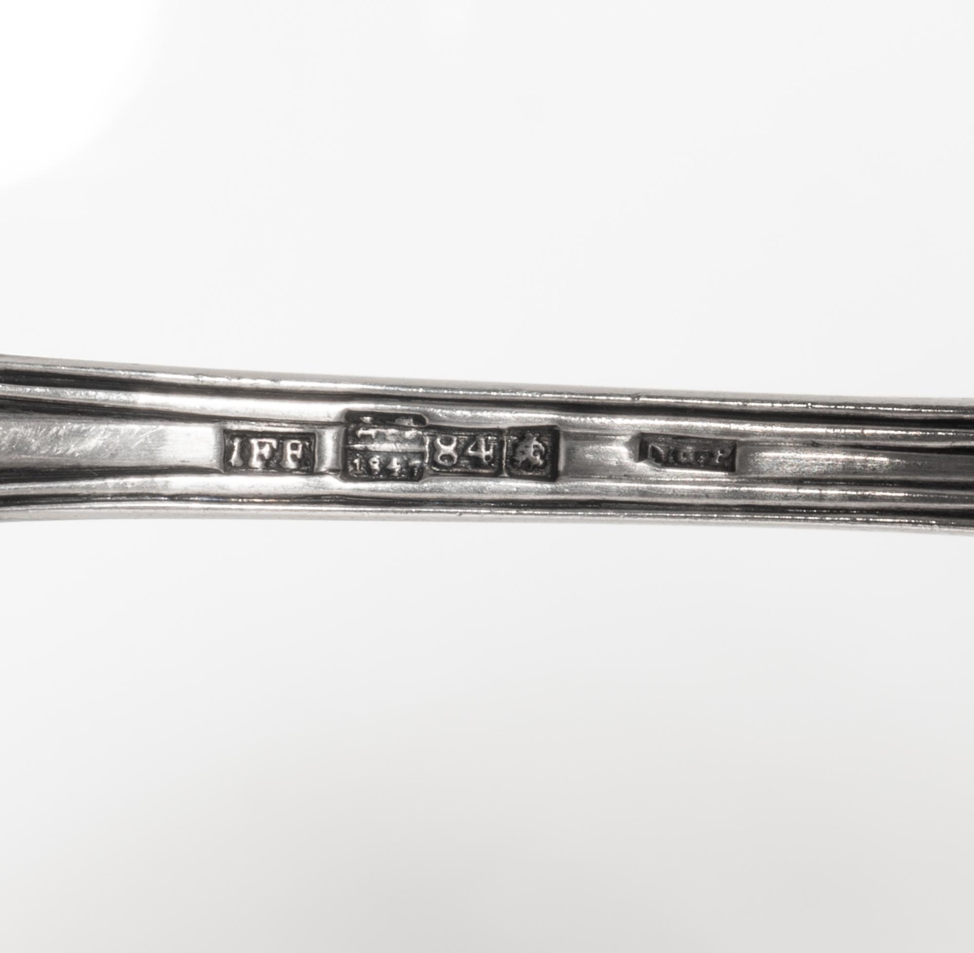A Group of Three Russian Silver Flatware Serving Articles