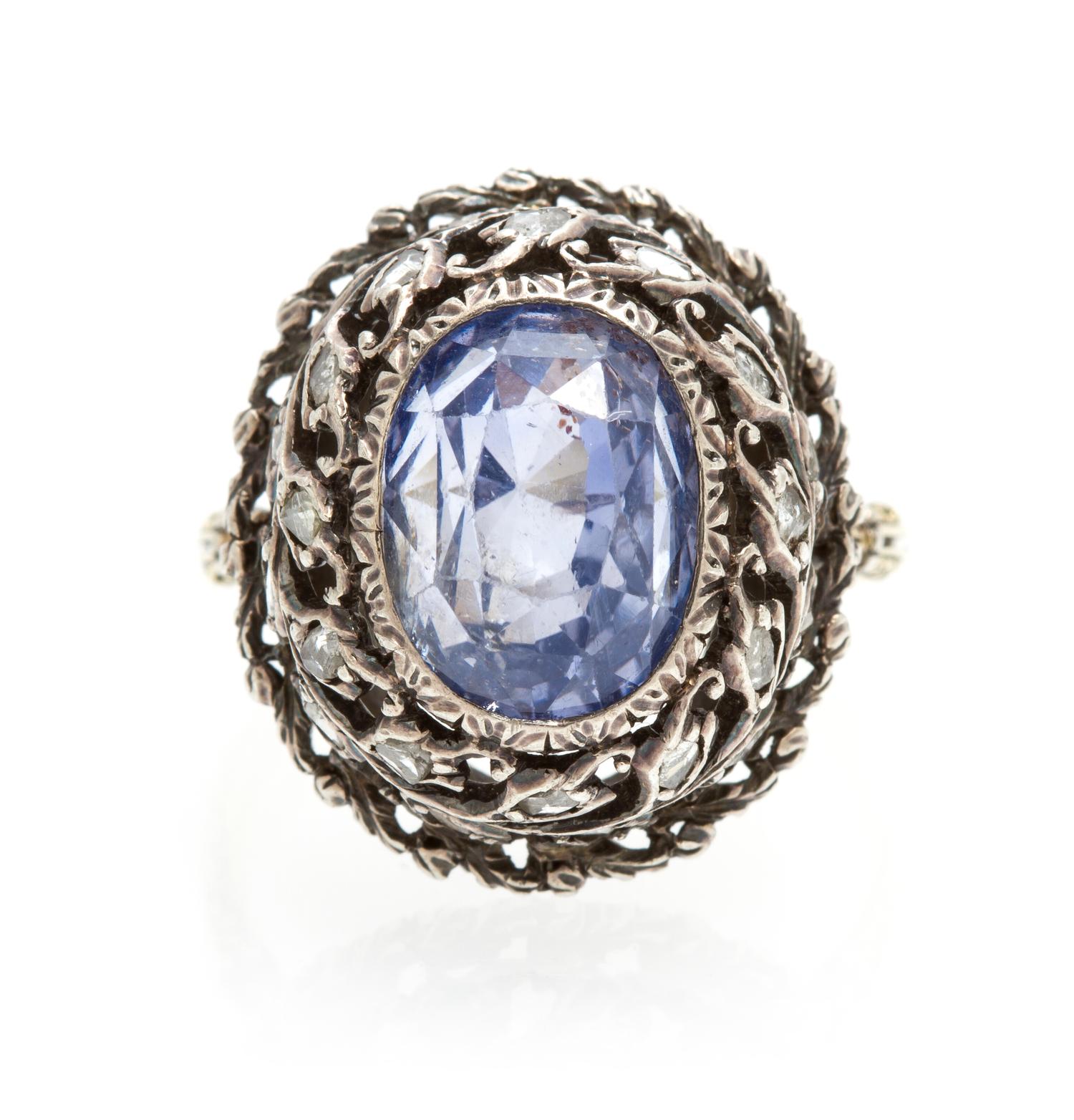 An 18 Karat Gold, Sapphire and Diamond Ring, M. Buccellati, 3.40 dwts.