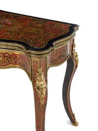 A Napoleon III Style Gilt Bronze Mounted Boulle Marquetry Flip-Top Table