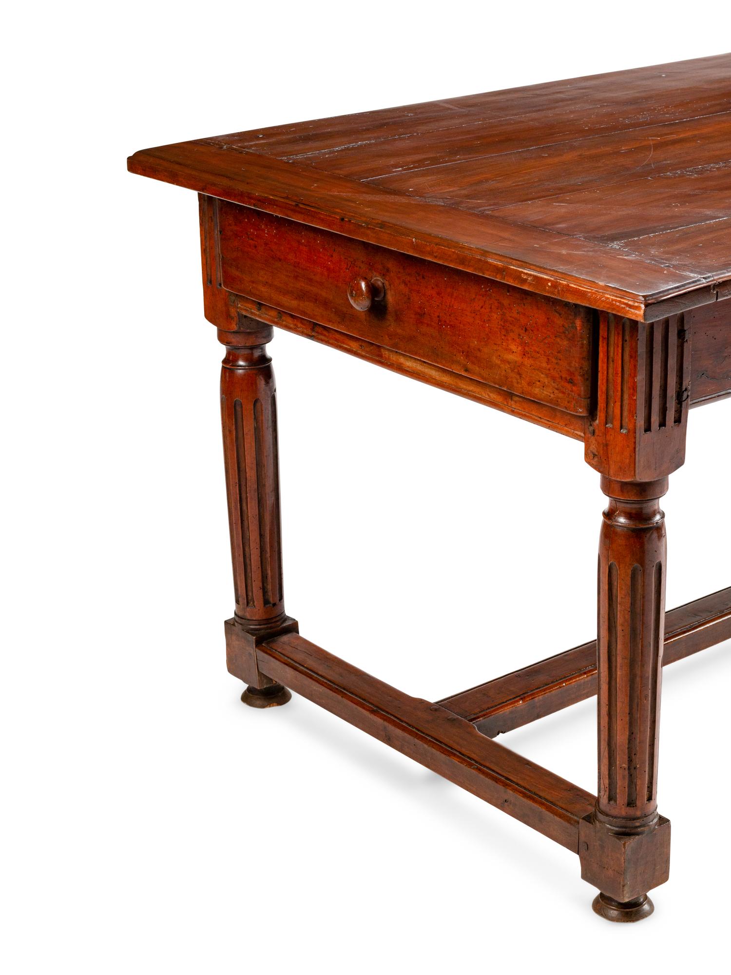 A Louis XVI Provincial Walnut Table — LATE 18TH CENTURY