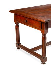 A Louis XVI Provincial Walnut Table — LATE 18TH CENTURY
