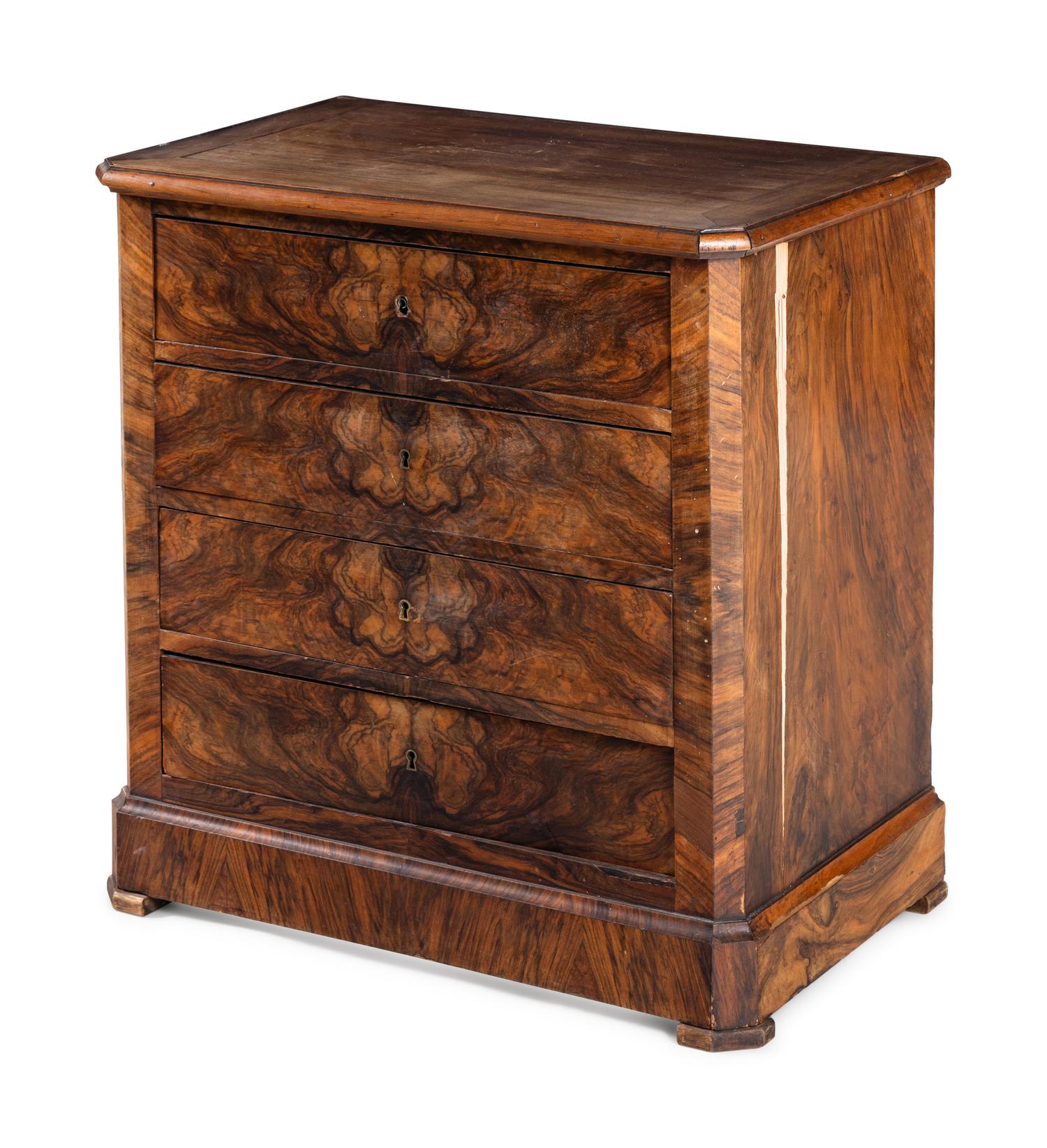 A Continental Figured Walnut Chest of Drawers