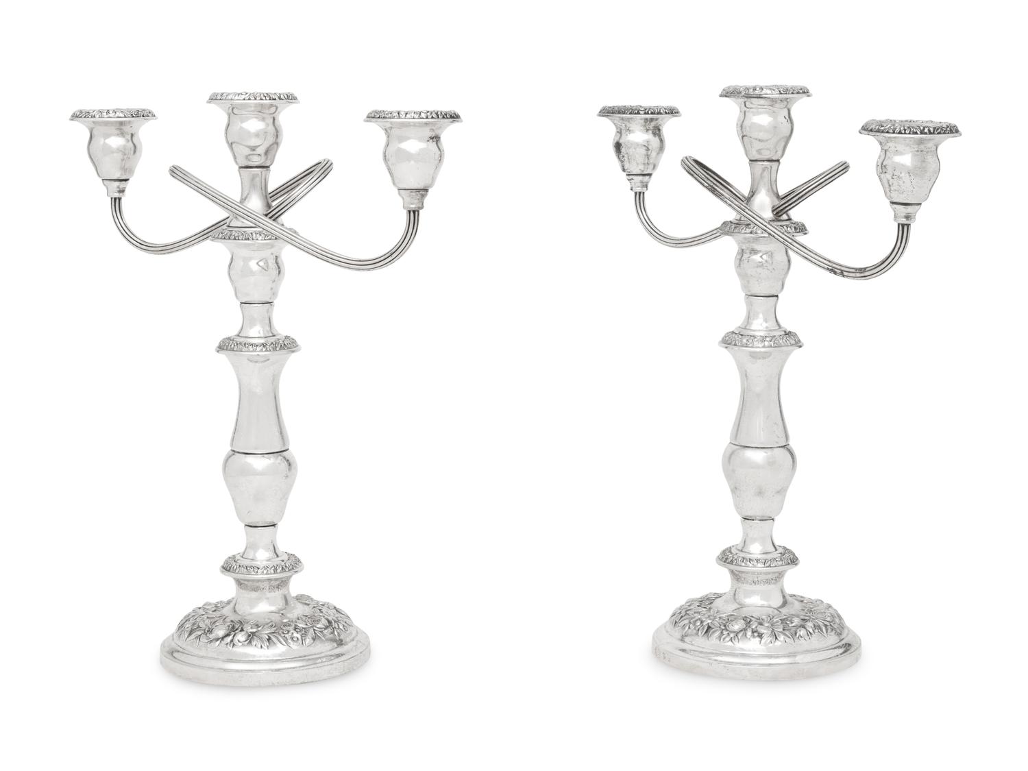 A Pair of American Silver Repoussé Three-Light Candelabra