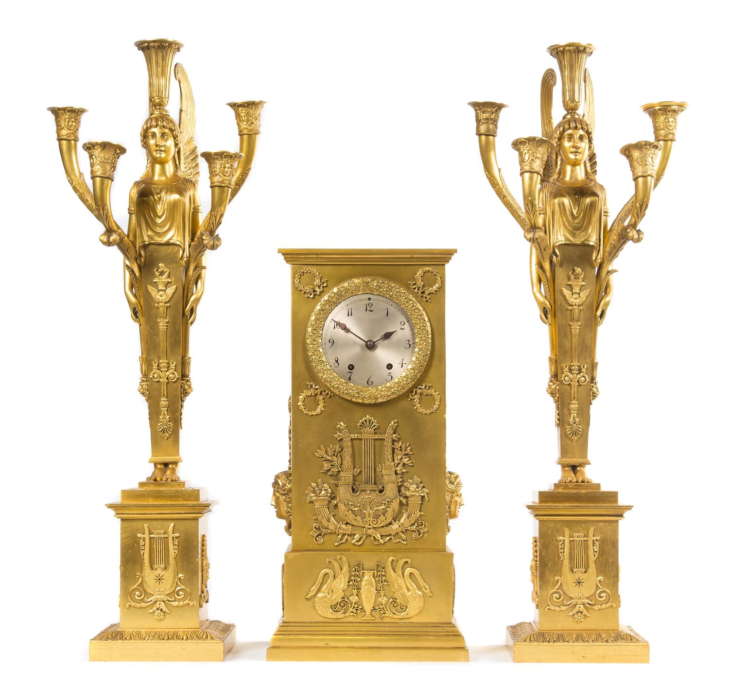 An Empire Style Gilt Bronze Clock Garniture Height of clock 18 inches. — 19TH/20TH CENTURY