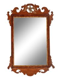 A Chippendale Parcel Gilt and Carved Mahogany Looking Glass