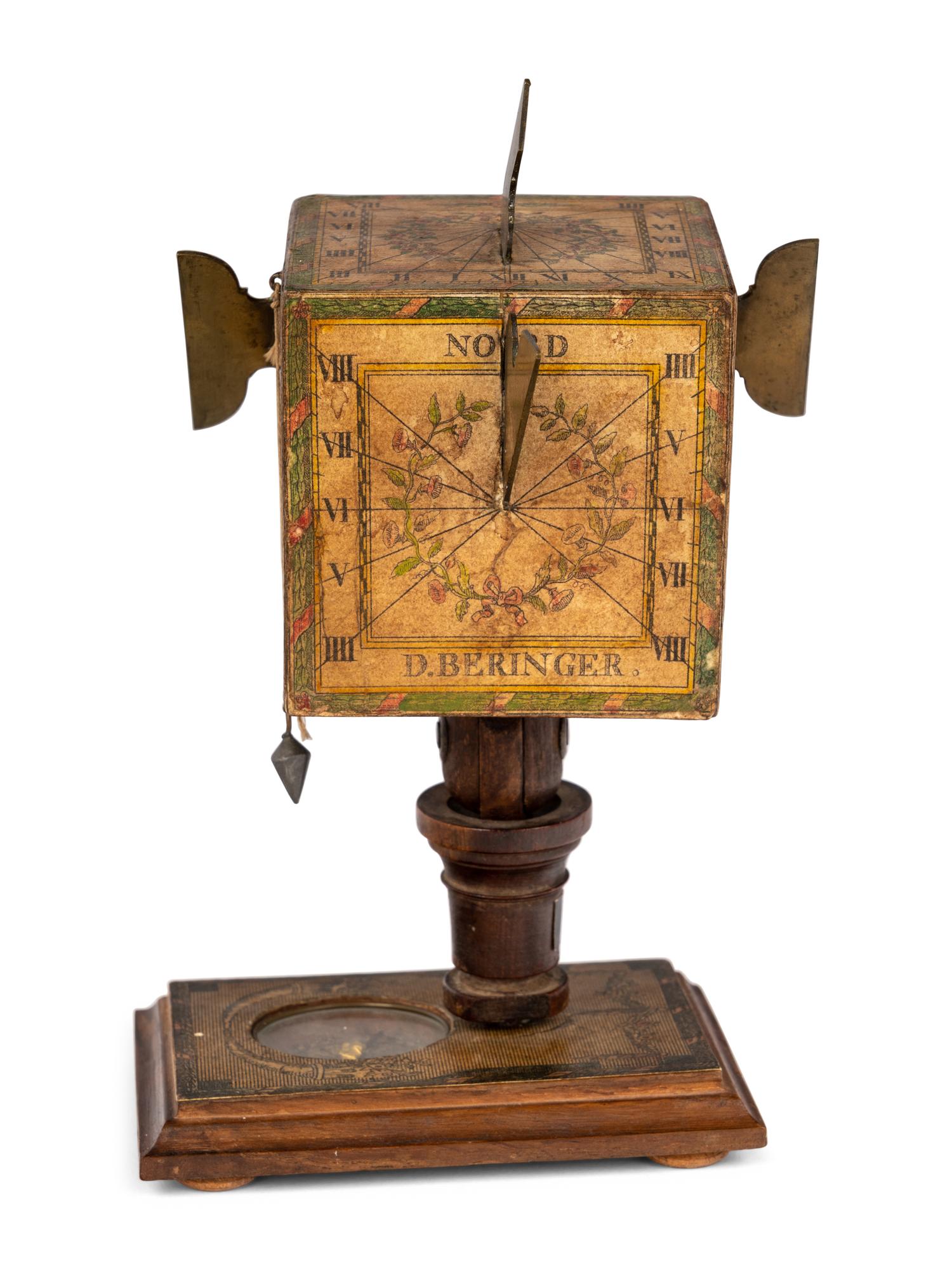 A German Fruitwood and Brass Polyhedral Portable Cube Sundial